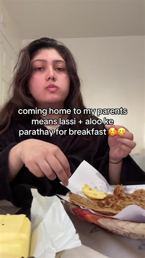 Enjoying Aloo Paratha for Breakfast in Punjabi Culture
