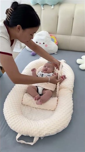 My husband arranged this bed-within-a-bed for my baby during my confinement peri