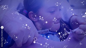 Receiving injection, child in medical procedure with molecular structure animation overlay