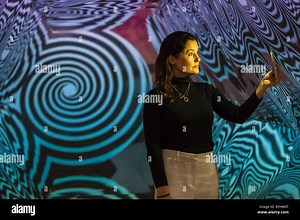 London, UK.  14 March 2019. Artist Laura Buckley poses in her work "Fata Morgana", 2012, a giant kaleidoscopic artwork featuring projection using a video recorded on a smartphone.  Preview of "Kaleidoscope", a new exhibition at the Saatchi Gallery featuring the work of 9 contemporary artists.  The show runs 15 March to 5 May 2019.  Credit: Stephen Chung / Alamy Live News Stock Photo - Alamy