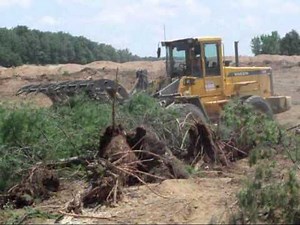 Craig Manufacturing - Land Clearing Rake on a Volvo Wheel Loader