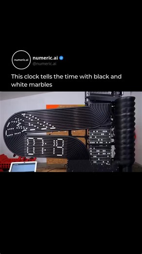 AI • Tech • Future on Instagram: "Ever wonder what happens when mechanical engineering meets pure kinetic art? Creator Ivan Miranda has built a mesmerizing digital clock that doesn’t use LEDs or LCDs, it uses thousands of black and white marbles. Driven by a complex system of 3D-printed tracks and motorized elevators, the clock updates every minute by physically sorting marbles into a grid. This « rolling ball » display is a masterclass in precision timing and computational logic. It’s a rhythmi