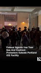 Tear gas filled South Bancroft Street in Portland, Oregon, as federal agents reportedly used crowd control munitions to disperse a crowd of protesters outside an ICE facility. | Newsweek