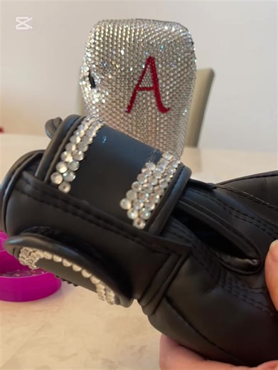 Customizing glove boxing with hand-inlaid crystal stones is a unique art form. Each pair of gloves tells its own story through the careful placement of sparkling crystals. Artisans spend hours selecting the perfect stone ensuring they fit just right. This process transforms ordinary gloves into dazzling pieces of art. #handmade #customized #crystals #art #artist #artistsoftiktok #boxing #boxing🥊 #boxiggloves #boxingday #rhinestoneart #crystalart #crystalartist #bling #dubaibling #artwork #uae #