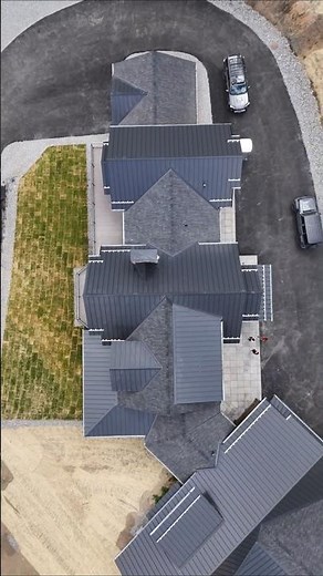 Timber frame house & attached garage roofline