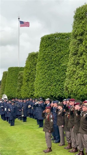 Bugler plays "Taps" at Normandy American Cemetery for those who died on the shores of Normandy