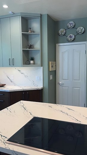 Our design manager, Joy, always here to bring beauty to each design. Our project manager, Paul, always here to ensure the centerpiece meets code 📐 Together? An unstoppable & very precise duo 👏 | Next Stage Design Build