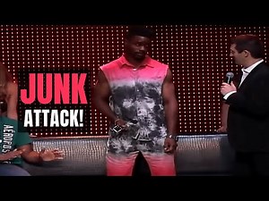 Hypnotized man gets his "junk" bitten on stage!