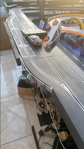 Mustang gt Porsche gt jump crash slow motion #slotcar #scalextric #scx #carrera