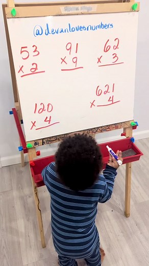 My 2year old genius solving vertical multiplication 💙🙏🏽 #devanlovesnumbers #babydev #smarttoddler #babygenius #earlymathskills #mathhelp #2yearsolds