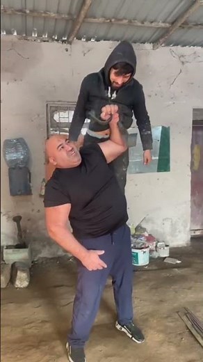 Can He Lift a 65kg Man With One Hand? 😳 #power #shorts