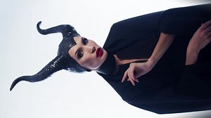 Beautiful Caucasian Woman in a Demon Costume