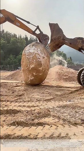 Teamwork in Dirt: How Two Machines Move a Massive Boulder