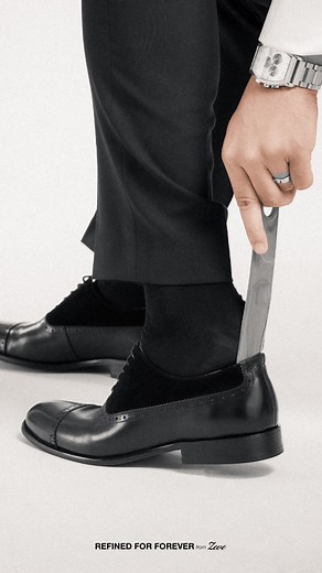 A timeless oxford with a modern edge. The Cavallo Oxford Cap Toe – Solid Black & Suede Leather blends smooth leather, rich suede, and classic brogue detailing for a groom-ready finish. Designed for moments that matter, from aisle steps to evening celebrations. Be the Man of the Hour. Discover more at zeve.com.my. #zeve #zeveshoes #zevewedding #groomstyle #weddingfit #groomfashion #manofthehour #groomedition #weddingready #mensfashionmy #blackpolishleather #formalshoes | Zeve Shoes