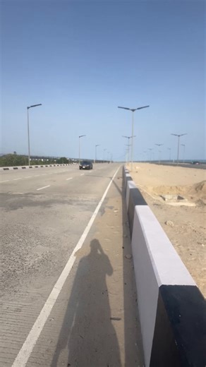 What you see right here is what we call spalling. It happens at the joints because concrete needs room to breathe and expand. When dirt or stones get into those gaps, the slabs have no space to move when it gets hot. They end up crushing against the debris and chipping off at the edges.From what I can see, it looks minor for now, but it is a red flag. A huge amount of money was invested in this project and the painful part is that it has not even been open to heavy traffic yet. If care is not ta