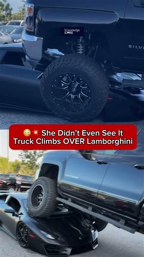 In a shocking clip, a woman driving a lifted truck accidentally drives straight over a Lamborghini