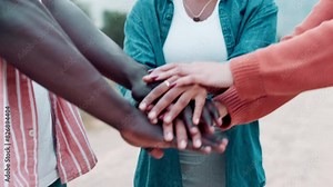 Friends, people and outdoor with hands stacked for unity, care and solidarity for support in Texas. Team building, collective and committed with cooperation, gathering and connection for group spirit