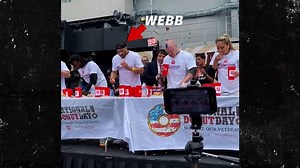 Major League Eater Scarfs Down 59.5 Donuts In 8 Minutes For National Donut Day