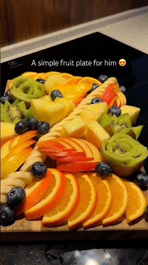 The most beautiful fruit platter you'll make today! 🍍🥝🍊
