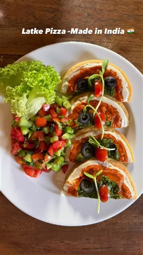 Sridevi Jasti | Latke Pizza, made in India 🇮🇳 A chickpea flour base inspired by tradition, topped with Genovese basil pesto, tomato marinara, and a creamy... | Instagram