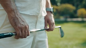 Golfer Holding Golf Club | Premium Stock Video Footage