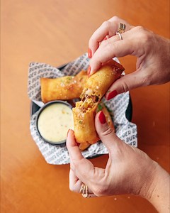WE'RE ON A ROLL🤤✨ A love story between our Beef & Cheese Burger and Spring Rolls. Beef, Tomato Jam, Mozzarella, Pickles, Onion & Warm Mustard Cheese Sauce. $14. Around for 2 weeks only! #SpecialSpecials | Burger Burger