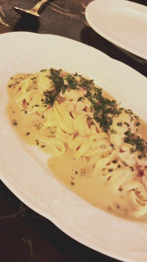 Modern Italian cuisine at Bar Prima 1136 Queen St. W. Toronto, ON. Menu Picks: Veal Chop Marsla Potato Pave Lobster Fra Diavola Scallops Rockefeller Mortadella & Tartufo Clam Toast #italianfood #torontolife #torontorestaurants #wheretoeat #vealchop #seafood #pasta