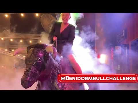 Pretty Girl in Black Beautiful Dress Riding on a Mechanical Bull 🐂 in Benidorm | 4K