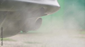Smoke emissions coming out of car exhaust, air clogging. Toxic gases from a car engine. Air pollution from the muffler. Emission of pollutants and Co2. Slow motion. Close-up Stock Video
