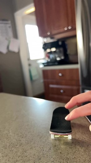 tricks on the tech deck pro series board@Tech Deck