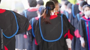graduation ceremony of students Wearing Mortarboard at graduation ceremony from behind