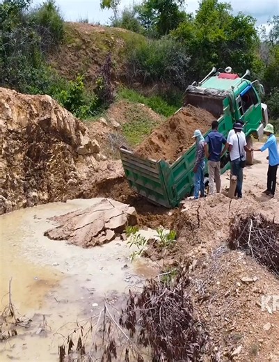 Komatsu Dozer D21P and 5-Ton Truck Fill Deep Pond | Green Goals
