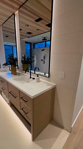 One of the main features in this #Netzero bathroom is the Kohler Anthem digital shower. And, of course, the incredible Desert views and integrated countertop sinks. | AFT Construction