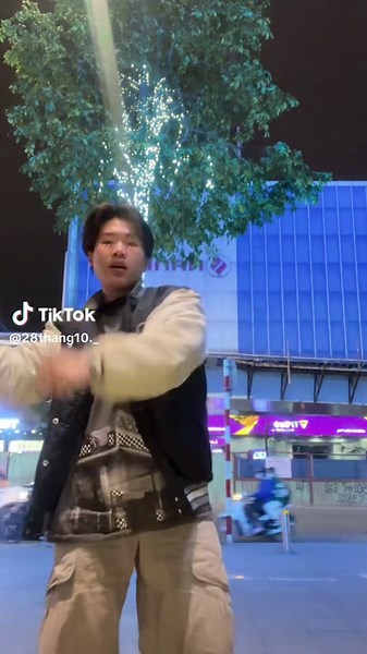 Street Performance Dance Duo in Urban Night Scene