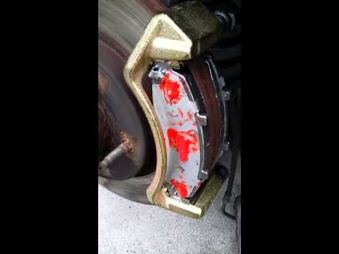 Replacing front brake pads on a 1999 Ford F150.