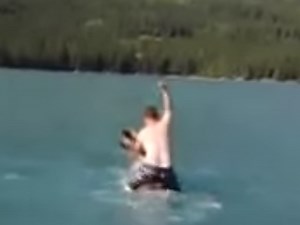 Two B.C. men charged with harassing wildlife over viral moose-riding video
