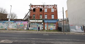 How are buildings designated as derelict?