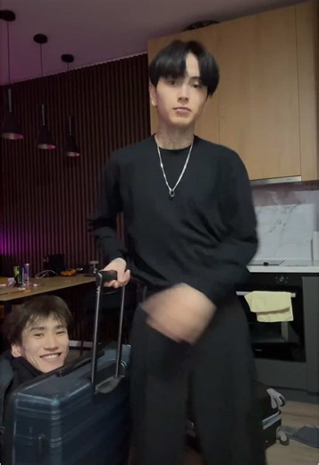 Creative Kitchen Performance with Luggage