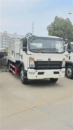 HOWO W45 6cbm skip loader truck