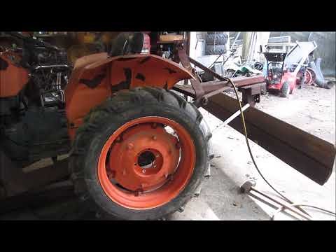 kubota tractor gets junk yard china tires/rims drilled to fit
