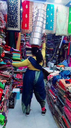 Exploring Colorful Fabrics in a Busy Store