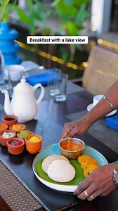But not the “pretty view, average food” kind. Because, most hotel breakfasts are the same movie on repeat: toast, omelette, one fruit bowl… and a buffet line that feels like Monday in formal wear. Here, you sit down and South India arrives on a banana leaf. And the lake does that magic thing: you chew slower, speak softer, and suddenly remember you’re a person, not a walking to-do list. And before you know it, breakfast is the vacation. Not the “fuel up and run” part. The main event. So tell us: