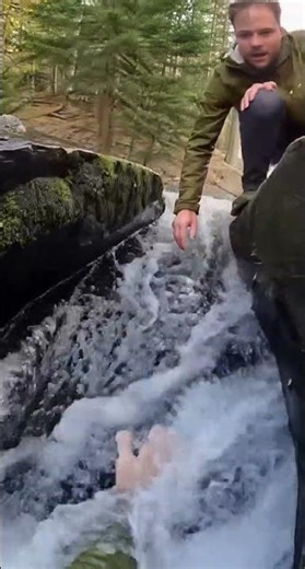 SLIDING INTO WATERFALL STREAM