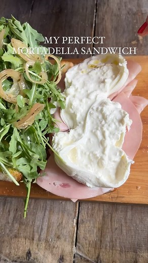 Mortadella sandwiches…I’m obsessed! And this one is truly spectacular. You barely need a recipe. Start with beautiful toasted bread. Add peppadew peppers, mayo, slices of mortadella, and a gorgeous ball of burrata. We added arugula, my Marinated Red Onions, and my delectable Pistachio Pesto. Click link in bio for my Italian sub recipe with mortadella. Who wants a bite? | nocrumbsleft