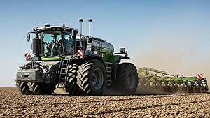 tractor operating in a vast agricultural field | Under Review