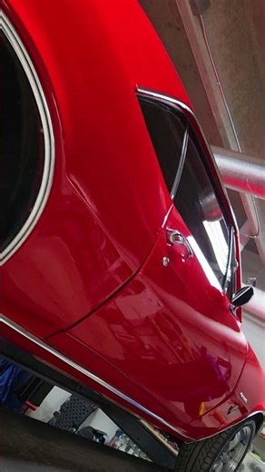 Low view of a classic #red #camaro
