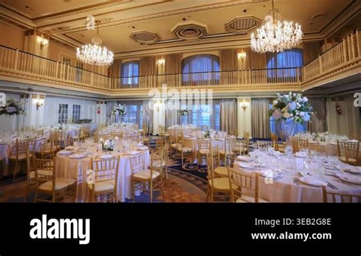 Luxury wedding reception hall with chandeliers and round tables. Elegant banquet setup and classic interior design. Drake Hotel. USA Chicago IL 2d Mayr 2025. High quality 4k footage Stock Video Footage - Alamy