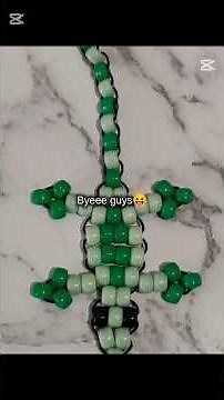 Making a lizard from a kandi kit I got from the dollar store 🦎 #fypシ゚viral #kandi #craft #beads