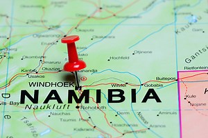Photo of pinned Windhoek on a map of Africa. May be used as...