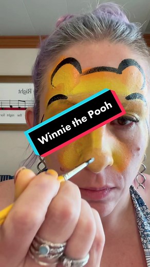 Winnie the Pooh Face Paint on a Cruise Vacation